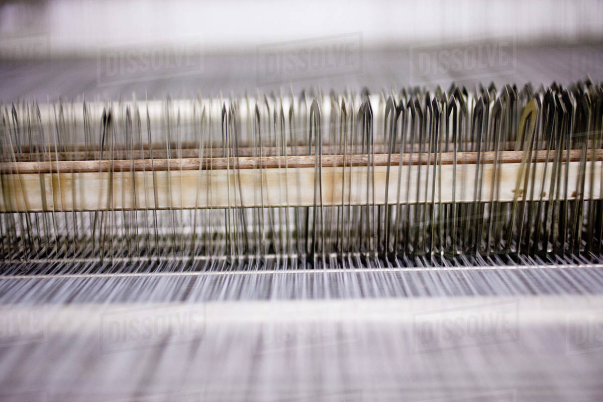 Weaving mill, lap of threads on loom Stock Photo Dissolve