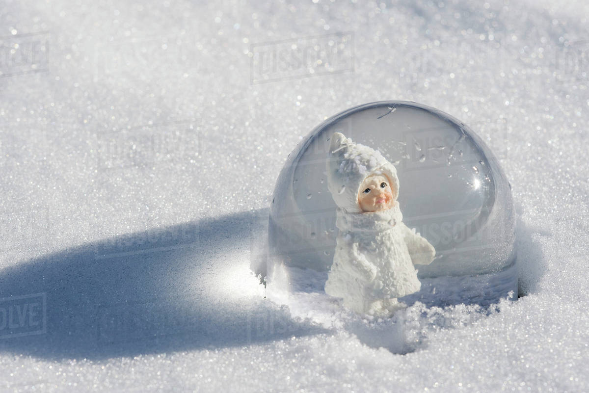 little girl snow globe