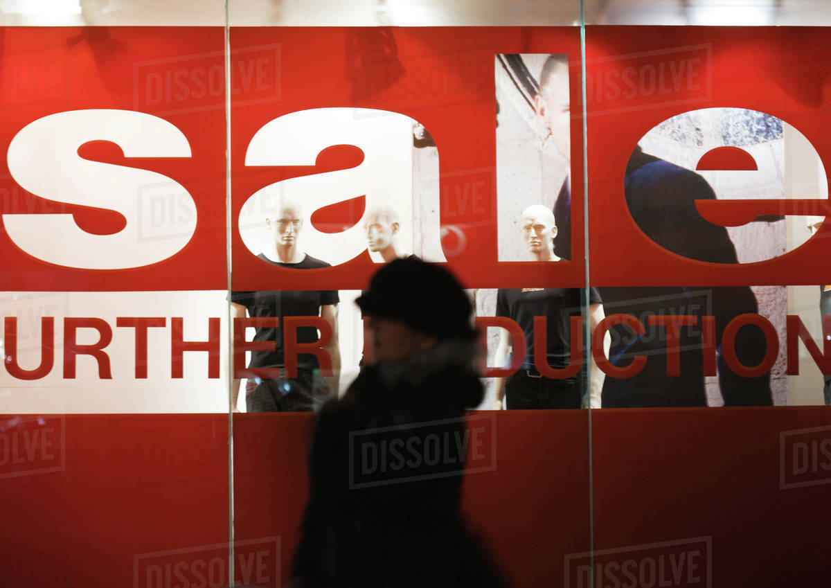 sale sign on shop window stock photo dissolve window sale sign