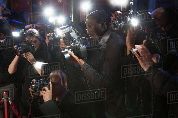 Paparazzi using flash photography at red carpet event - Royalty-free ...