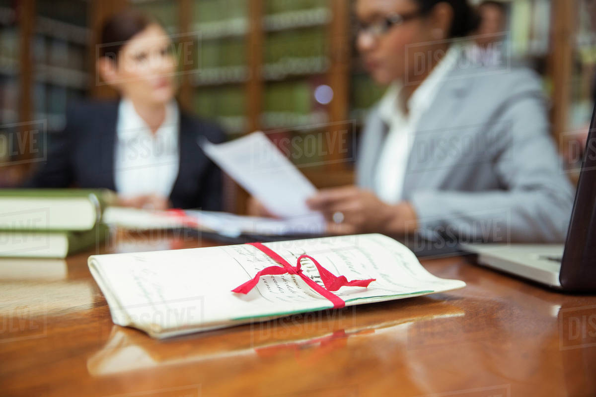 Lawyers talking in chambers Stock Photo Dissolve