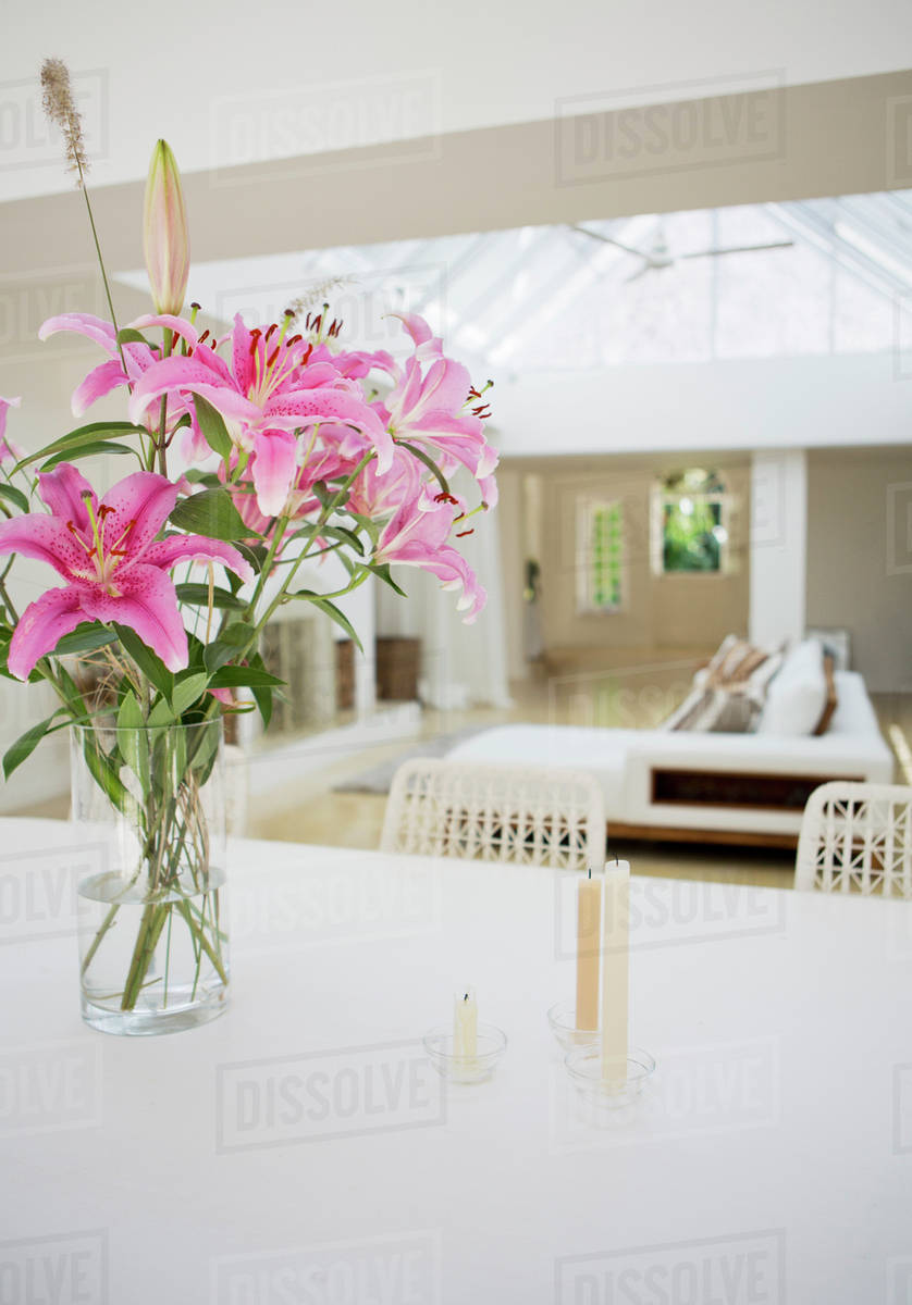 Candles And Bouquet Of Flowers On Dining Table Stock Photo Candles And Bouquet Of Flowers On Dining Table Stock Photo