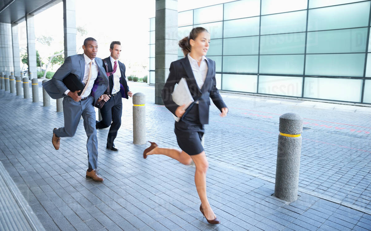 Business people running Stock Photo Dissolve