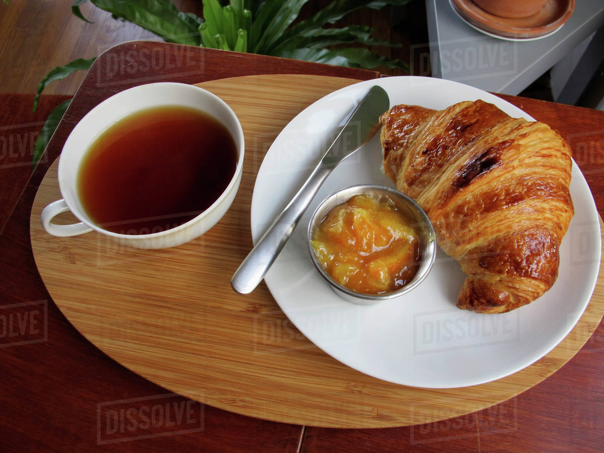 Tea, croissant and marmalade Stock Photo Dissolve