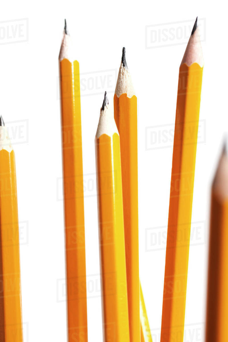 An arrangement of different length pencils Stock Photo Dissolve