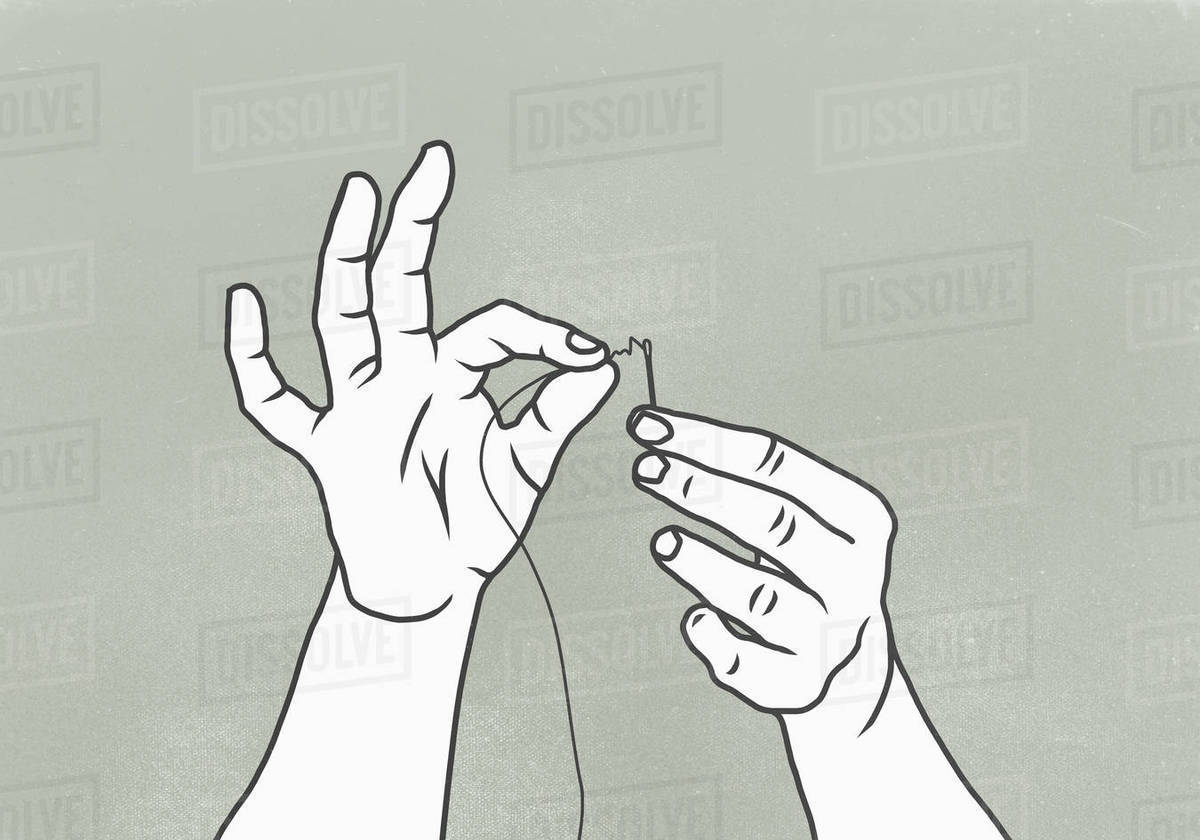Cropped image of woman threading needle against gray background