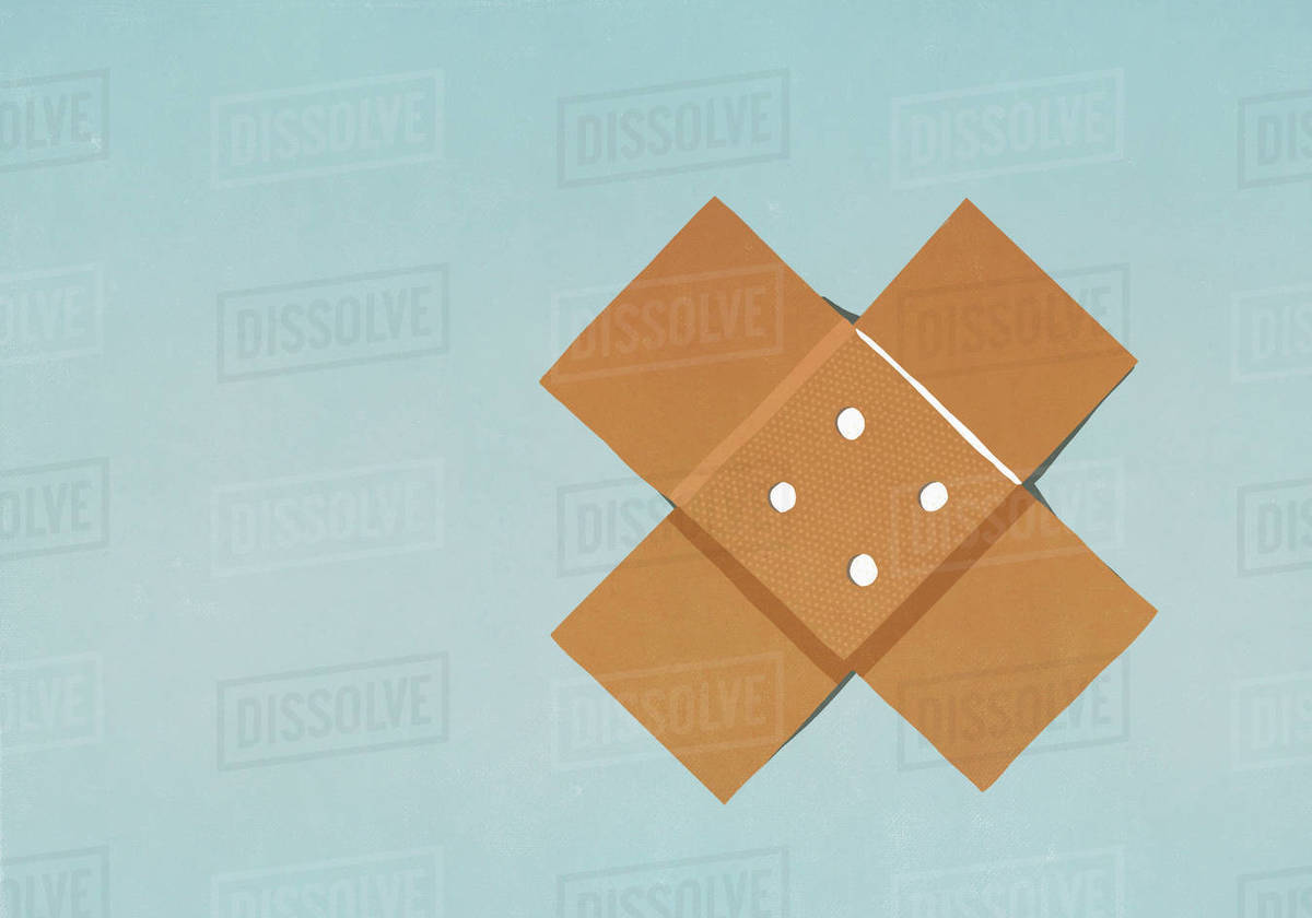 Adhesive bandage on blue background Stock Photo Dissolve